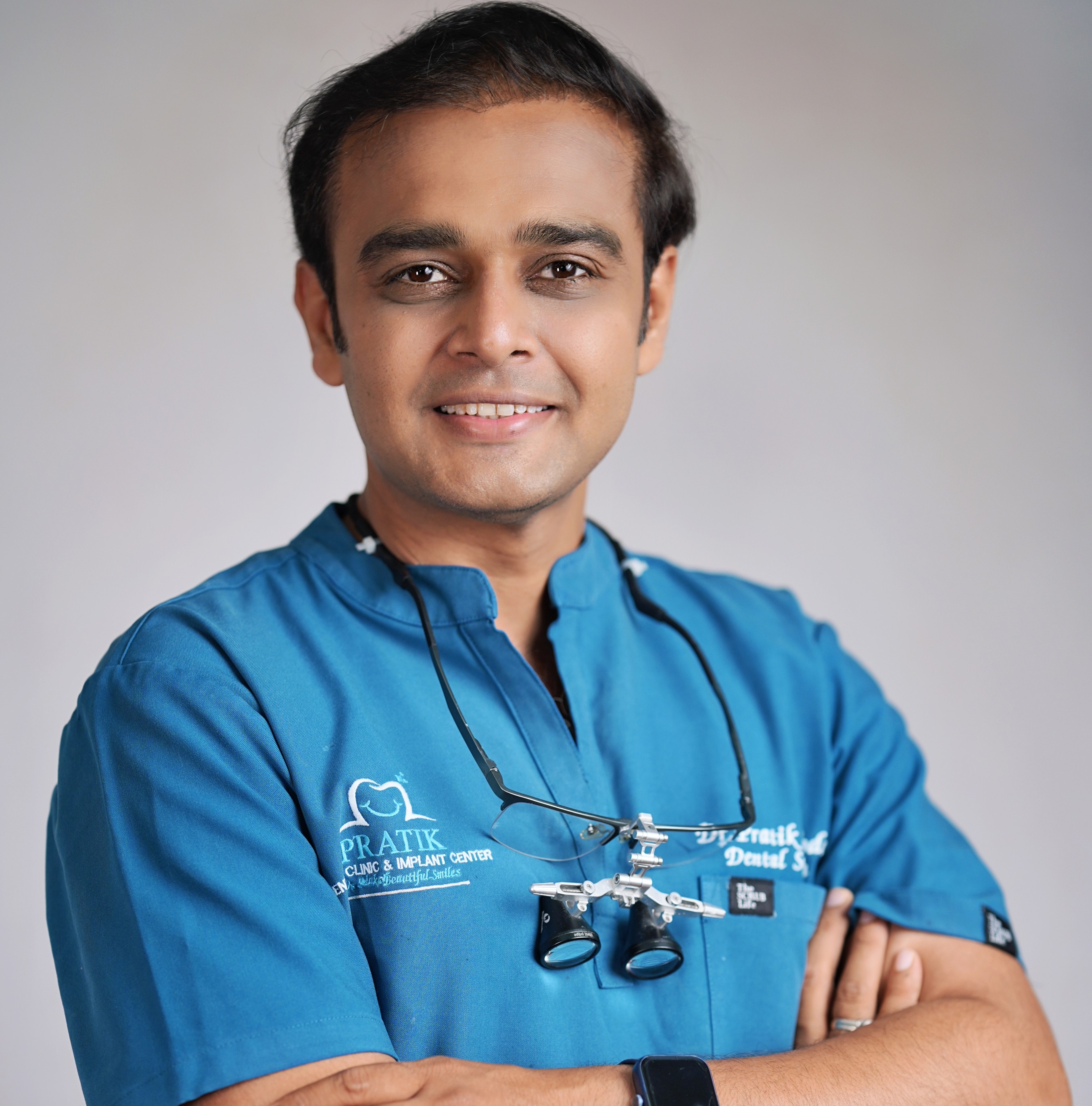Dr. Pratik Pitroda - Dental Implant Specialist